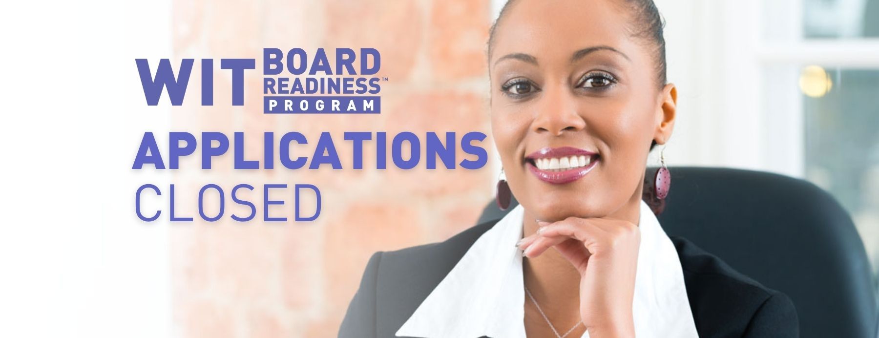 female-executive-board-member-sitting-at-computer
